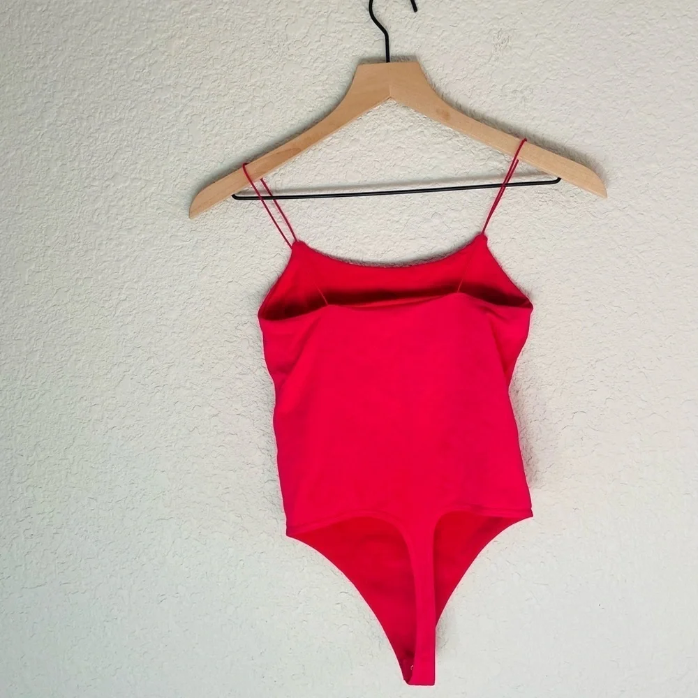 Free People Skinny Strap Pink Bodysuit